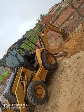 Máquina retroescavadeira cat 416E