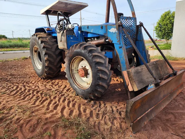 Trator new holland 7630 com lamina tatu 