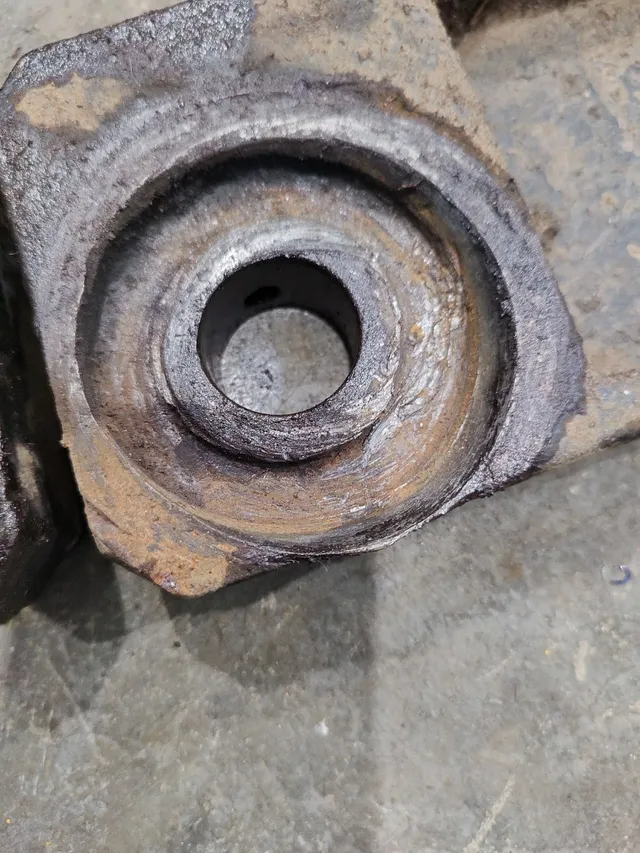 Manutenção em roda guia mini escavadeira 