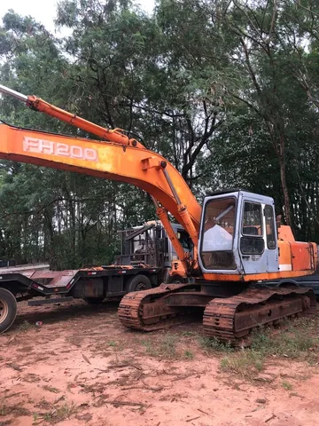 vendo otima escavadeira