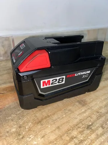 Bateria e carregador m28 novo