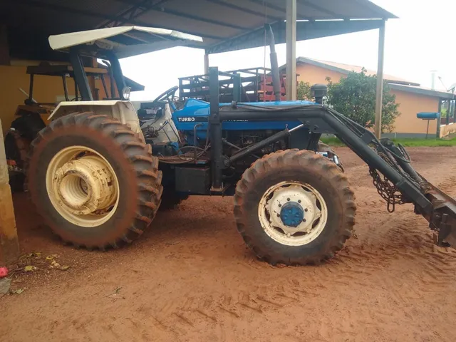 Trator new holland 7630 com lâmina, concha e guincho